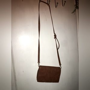 Brown leather wallet bag